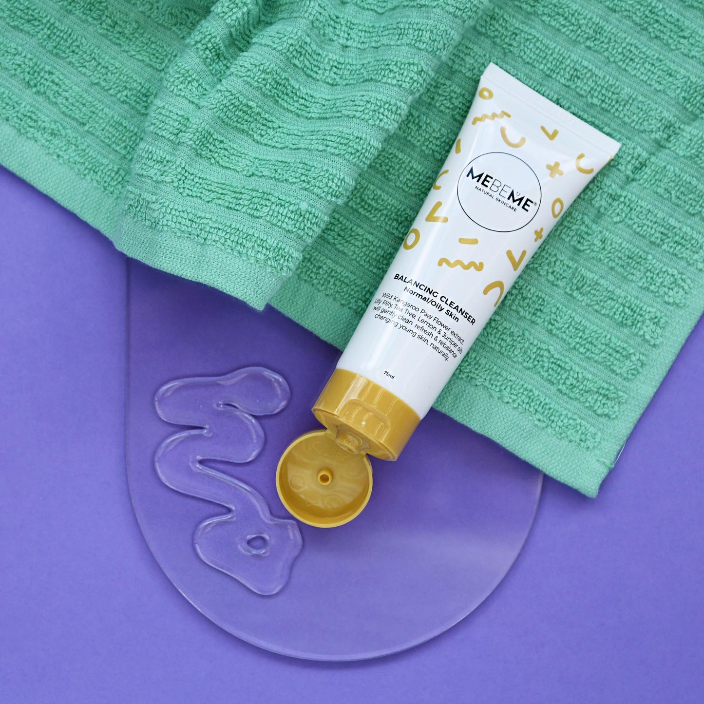 MEBEME skincare product with green towel and purple mat