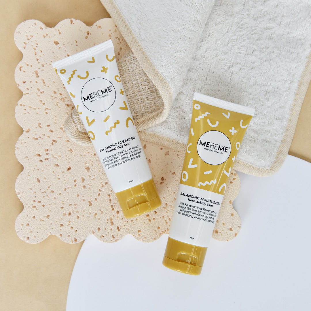 MEBEME balancing cleanser and balancing moisturiser on a textured surface with a towel in the background.